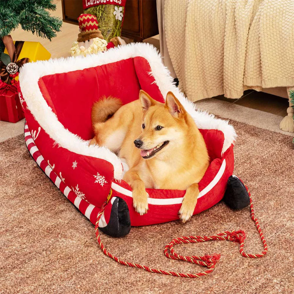 SantaPaws™ Kuscheliges Hundebett im Weihnachts-Schlitten-Design